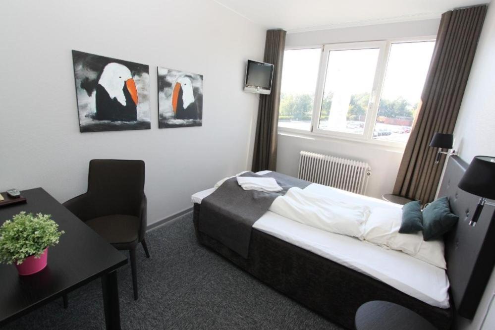 Banegaardshotellet Vojens Экстерьер фото